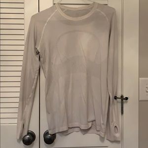 White lululemon shirt.